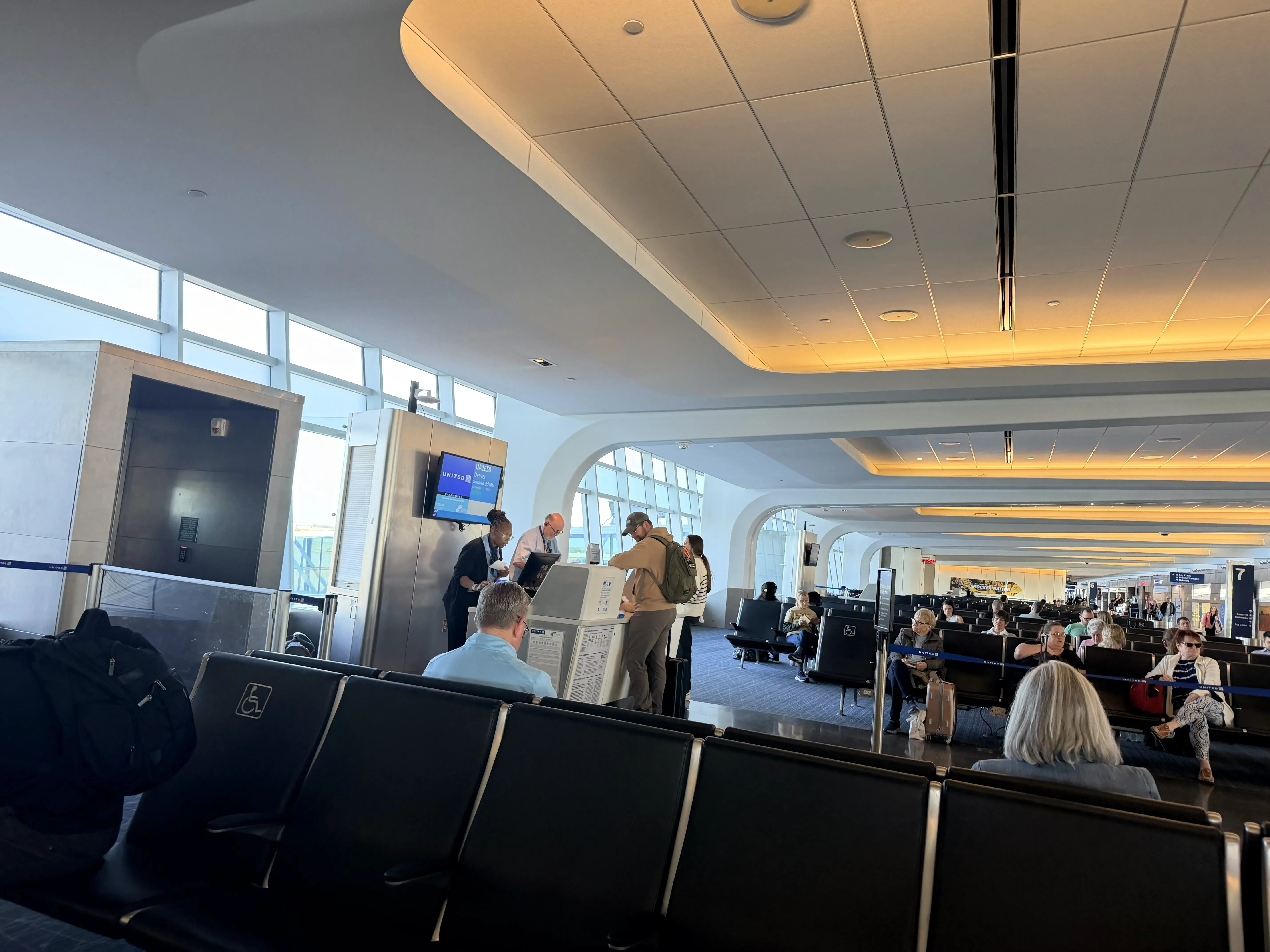 Wichita airport concourse showing Denver destination