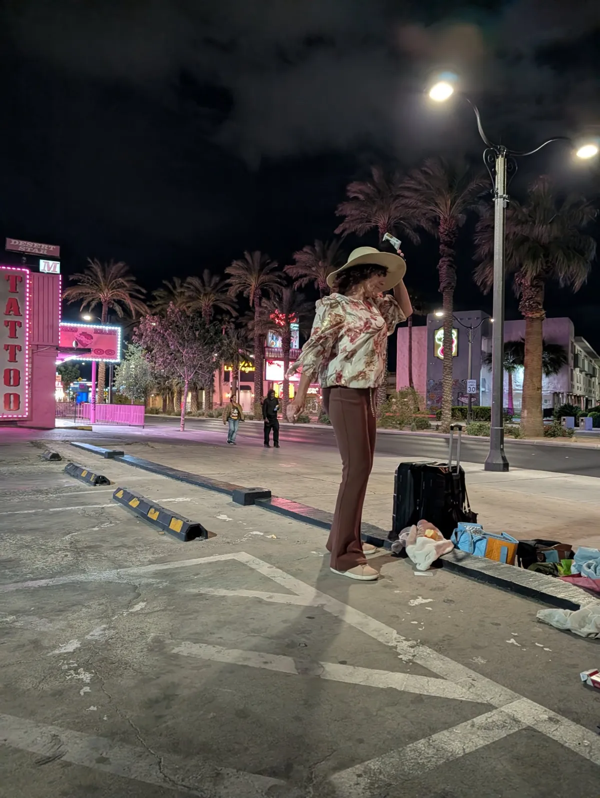 Gloria dancing in her hat